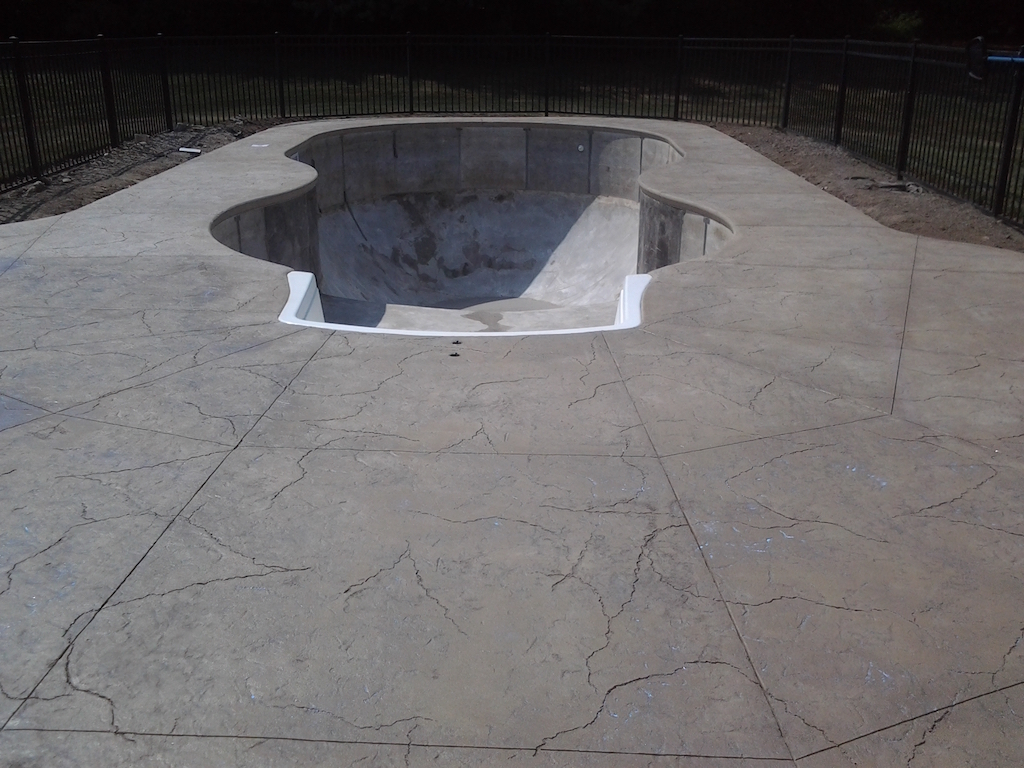 Swimming pool and stamped concrete project example 158